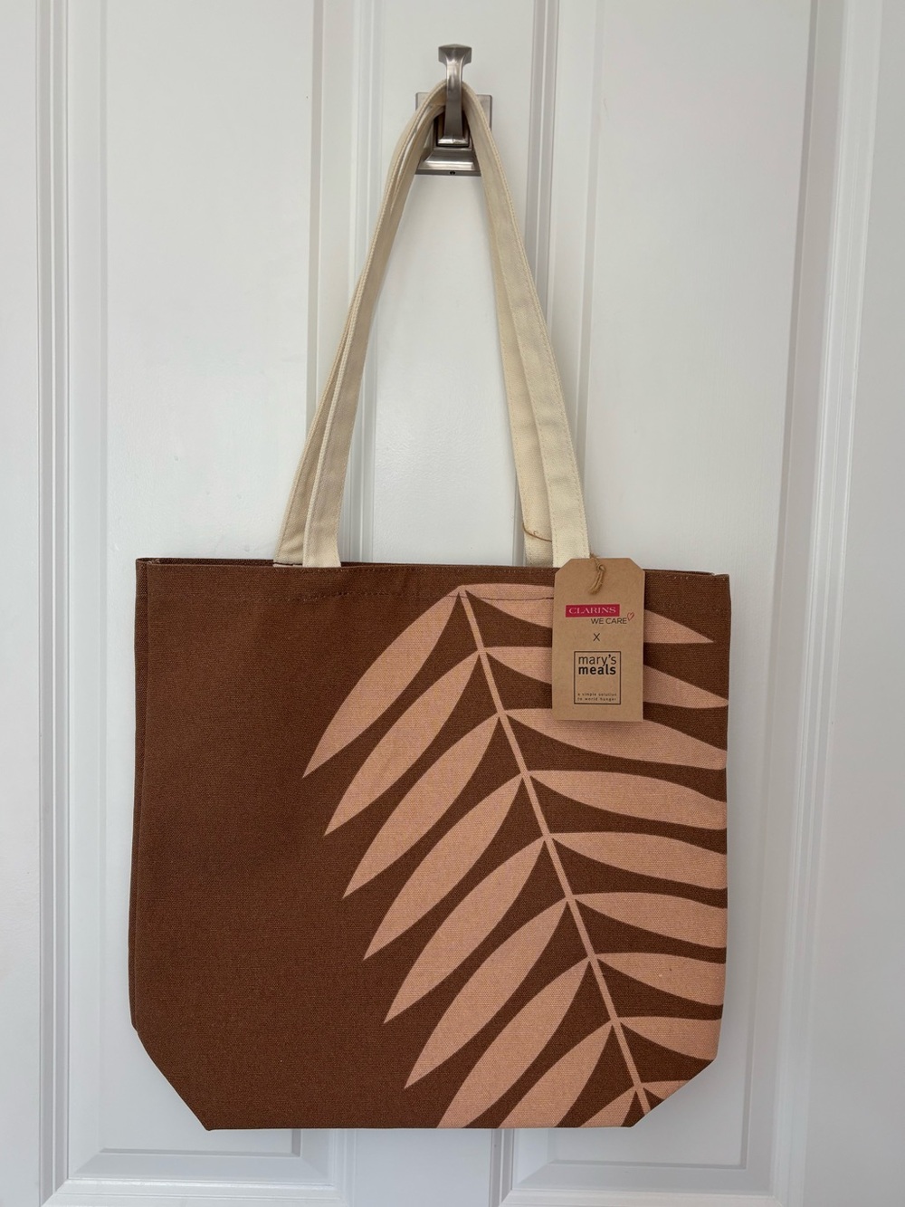 🌿Clarins Brown Tote with Leaf Print and Cream Handles🌿